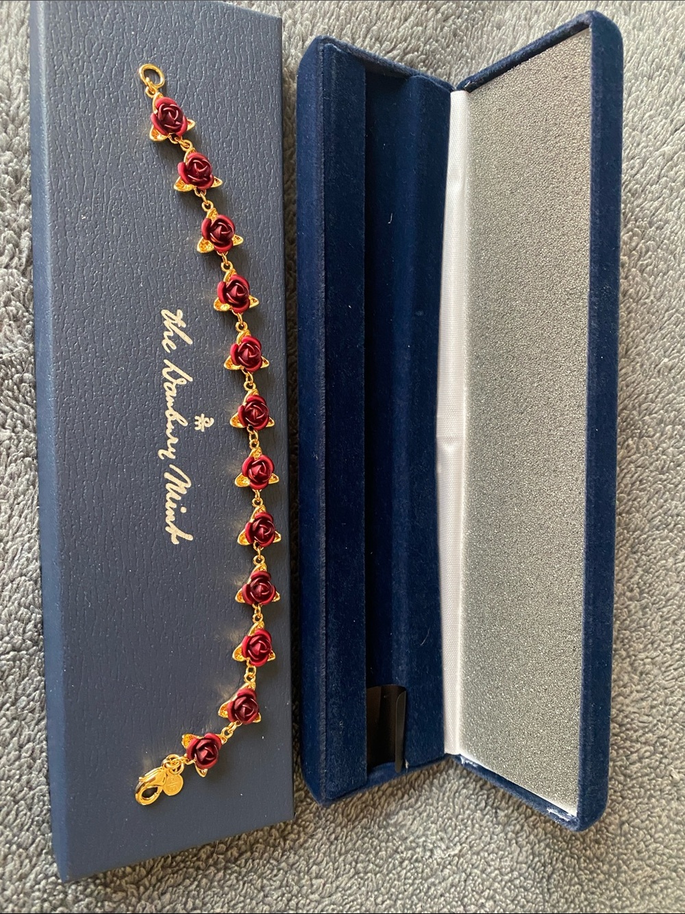 The Danbury Mint 14kt Gold-Clad Dozen Roses Bracelet.